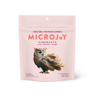 A bag of MicroJoy Hibernate Functional Mushroom Gummies with Reishi, Tryptophan, and L-Theanine. The gummies are for sleep enhancement, stress relief, and mood support. The bag is pretty with a colorful owl on it.