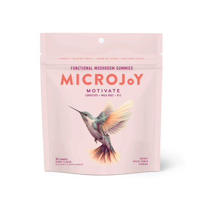 A bag of MicroJoy Motivate Functional Mushroom Gummies with Cordyceps, Maca Root, and B12. The gummies are for energy, brain power, and stamina. The bag is pretty with a hummingbird on it.