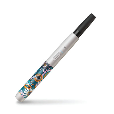 Vessel Botanica vapor pen with flowers and silver body.